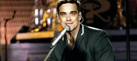 Роби Уилямс плаща 1 милион долара за клевета