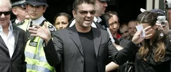 Джордж Майкъл се татуирал долу