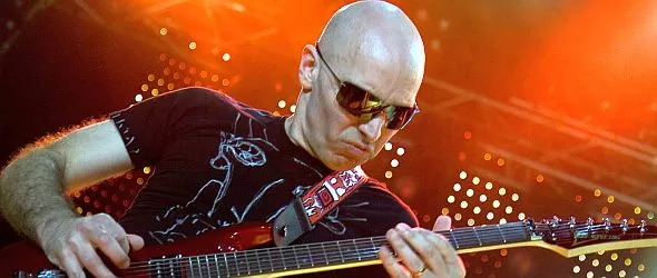 Колдплей и Сатриани се разбраха извън съда